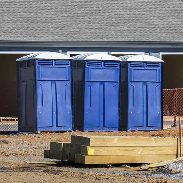 how often are the portable restrooms cleaned and serviced during a rental period in Heavener